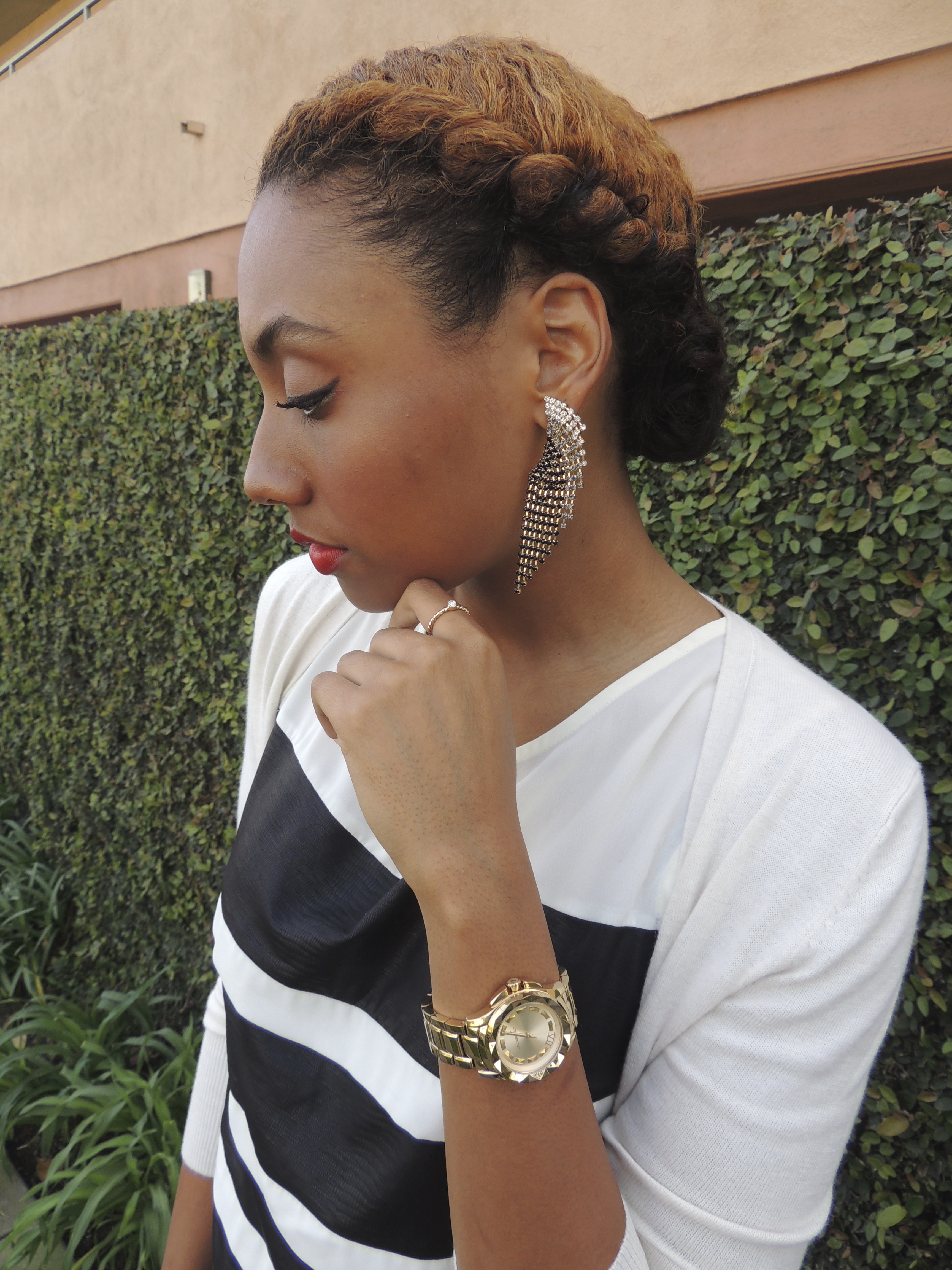 statements earrings and gold watch