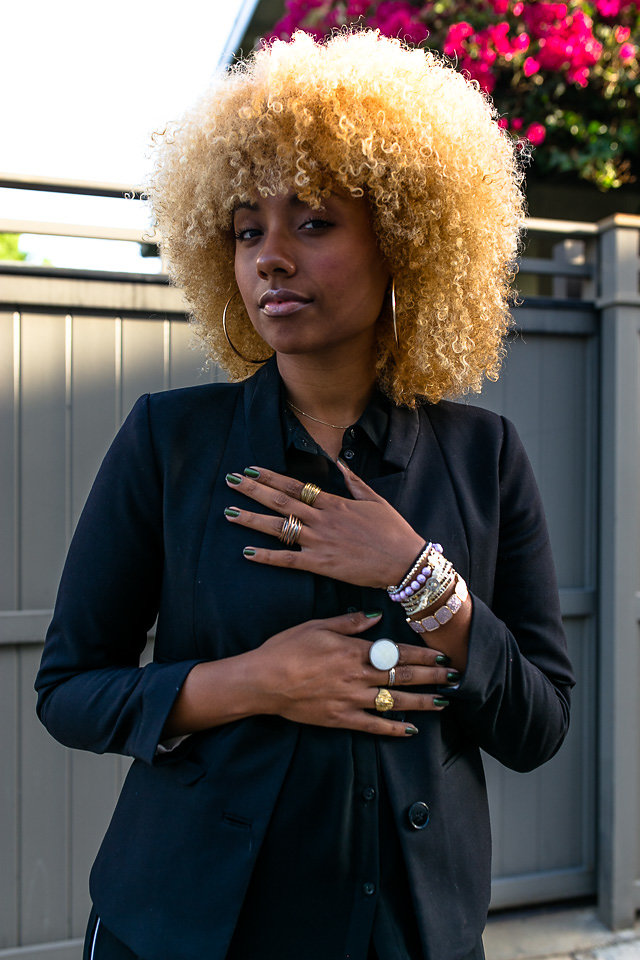 blonde afro-black-blazer-jewelry