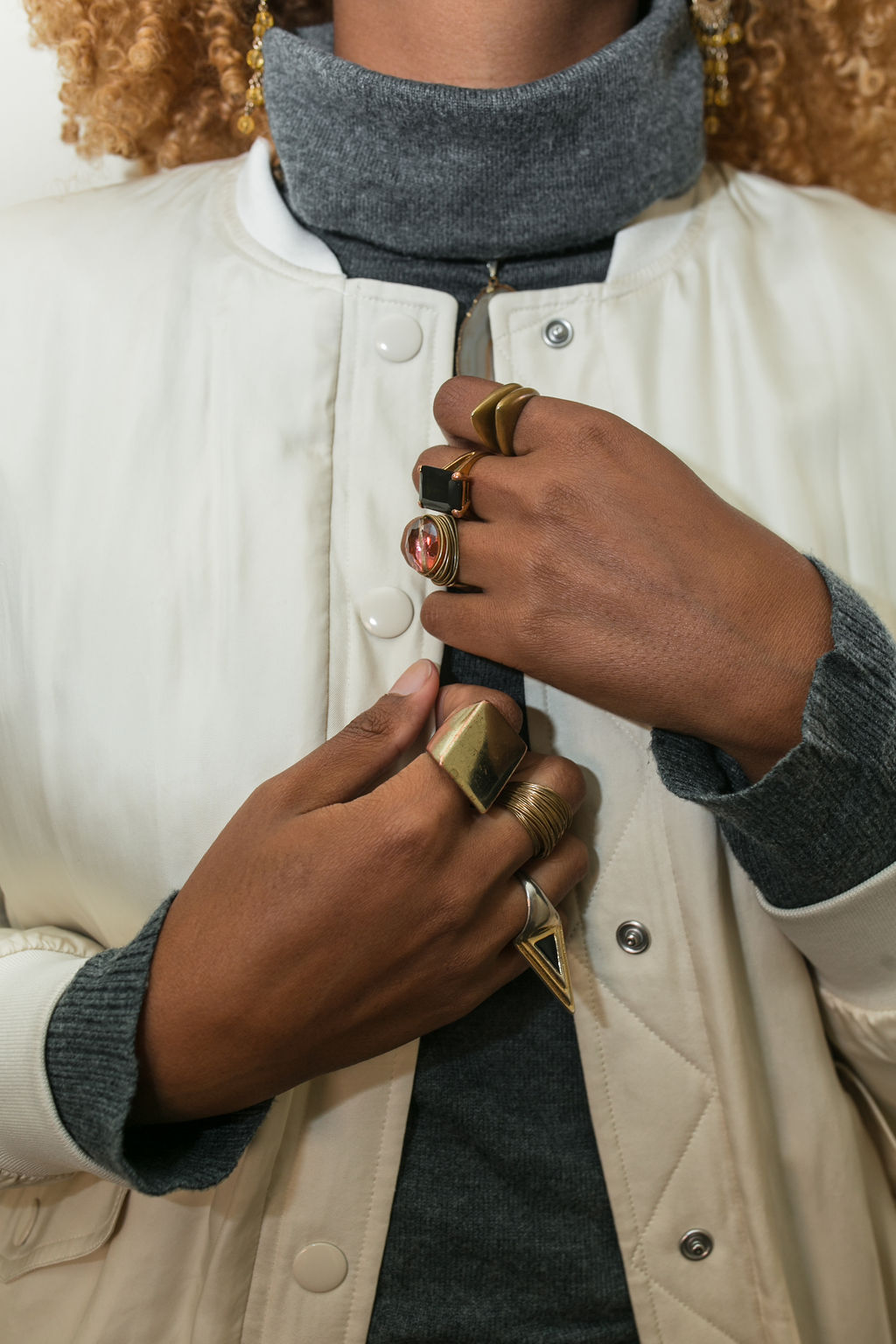 close up picture of rings on hands