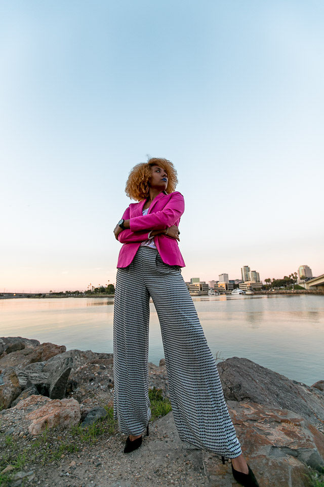 woman wearing wide leg pants and pink blazer