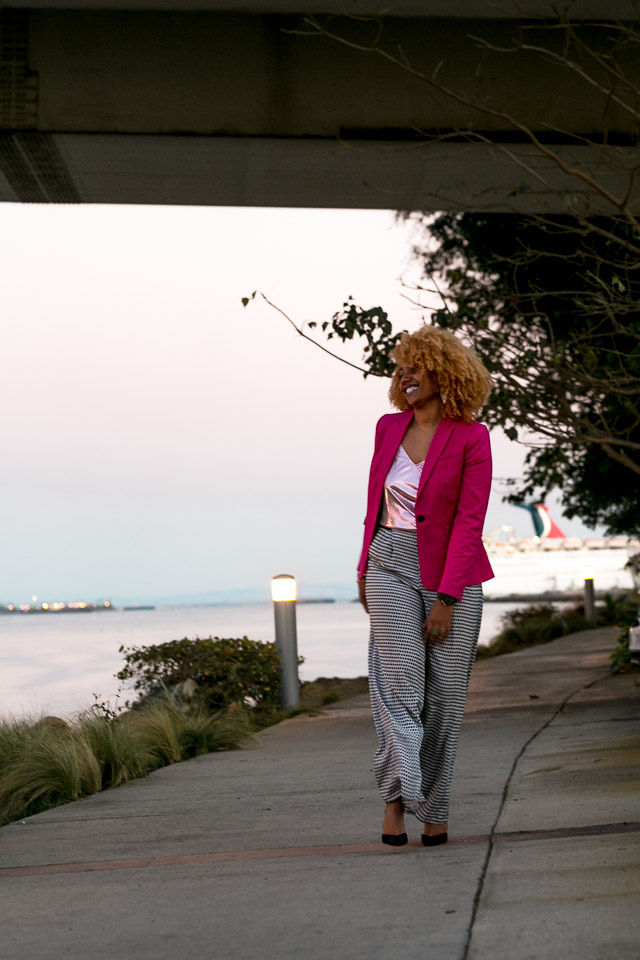 woman wearing a pink blazer work outfit idea