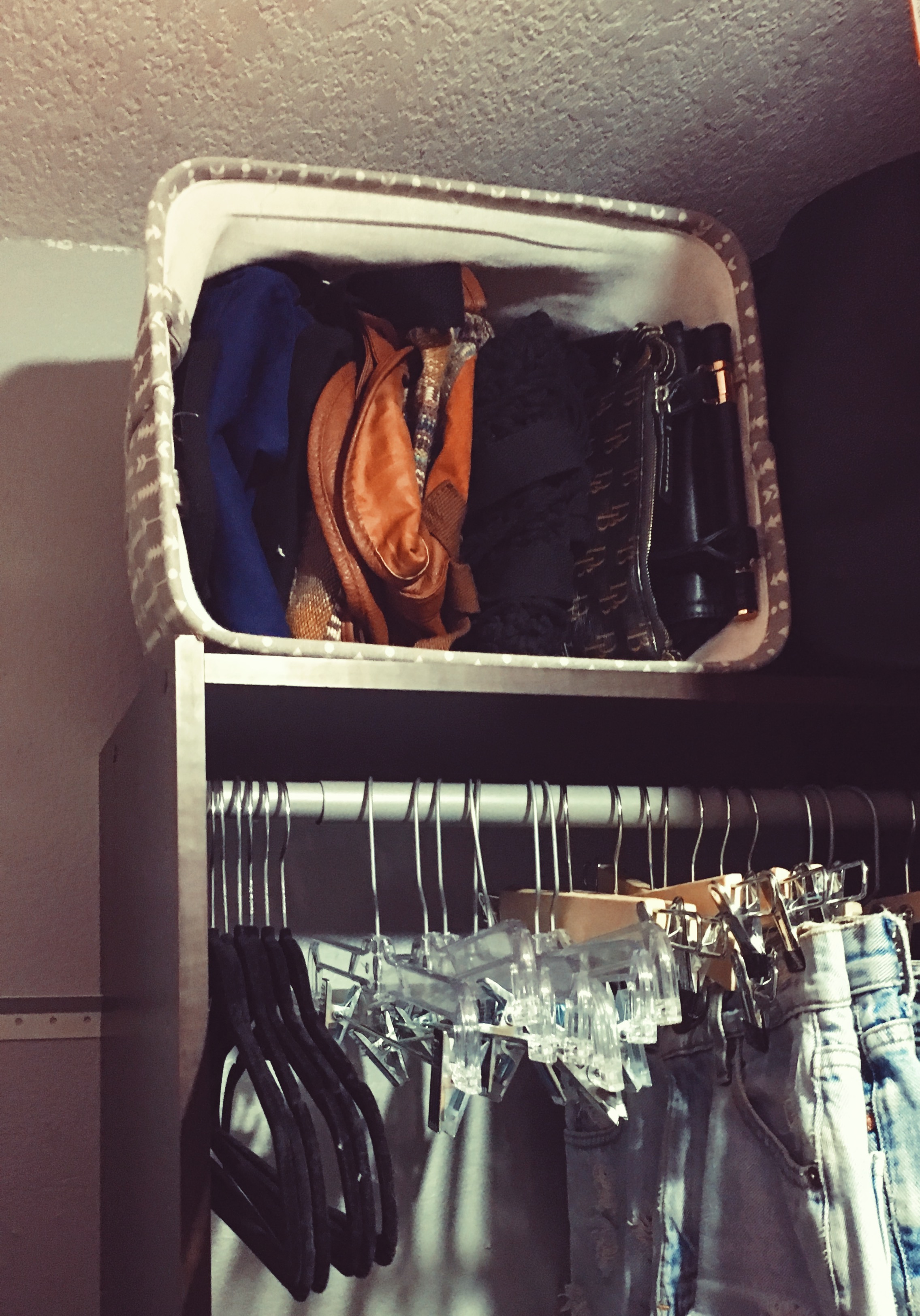 purses in a bin-purse storage-bag storage-closet organizing-wear who you are