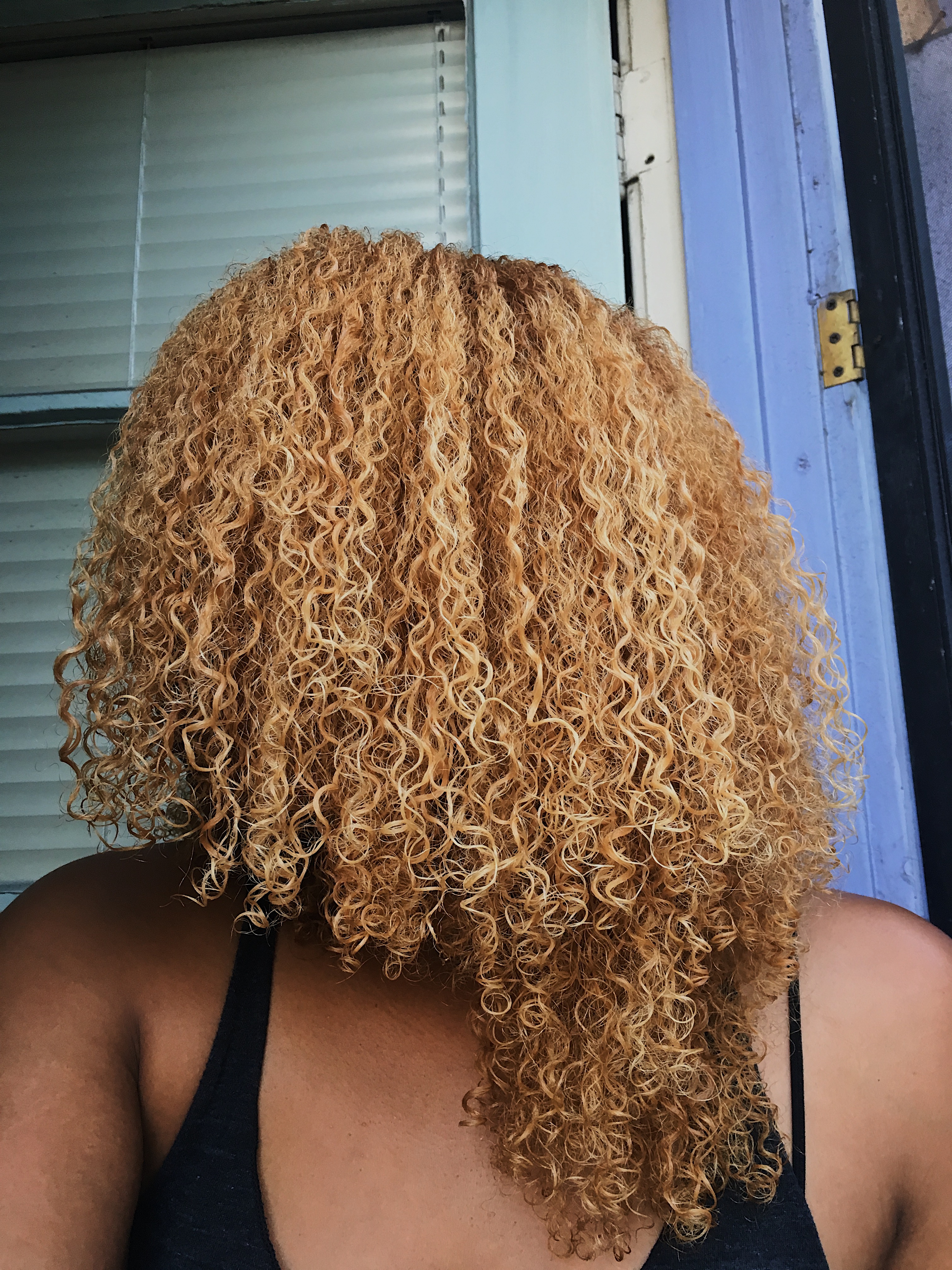 leave in conditioner-wet natural curls-blonde curls