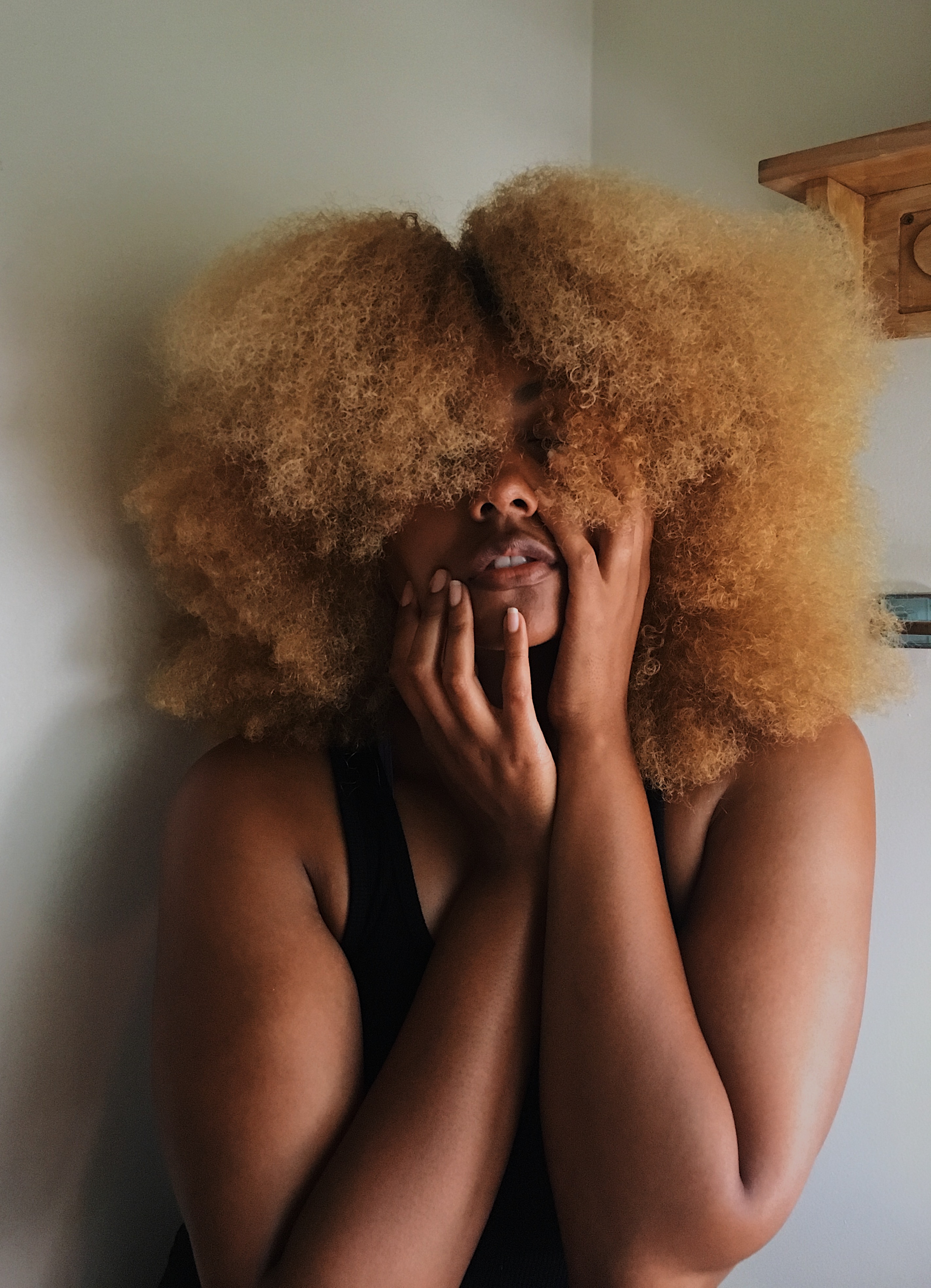 castor oil-blonde afro-natural hair
