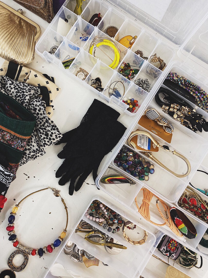 accessories-stylist-on set-gloves-necklaces-travel jewelry containers