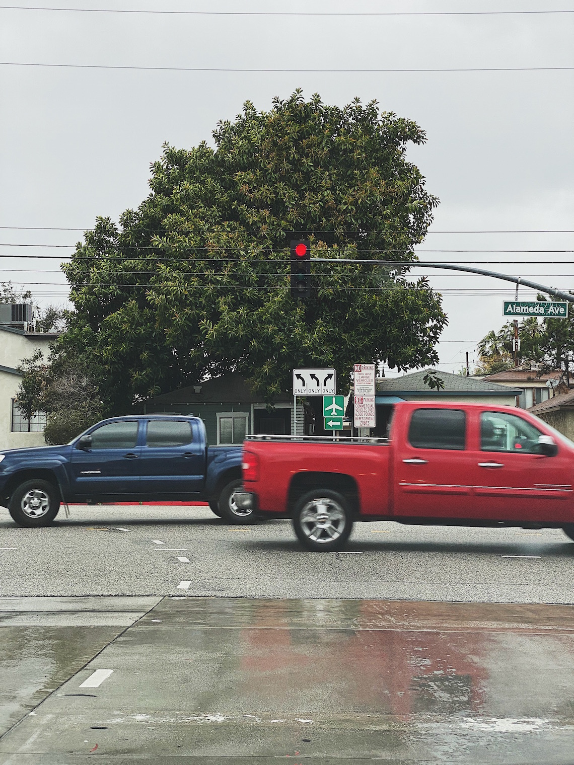 red light-road-rain-trucks-driving-gods grace